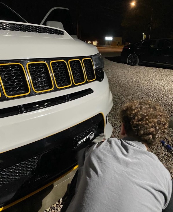 Cameron detailing a car in Tucson, Arizona