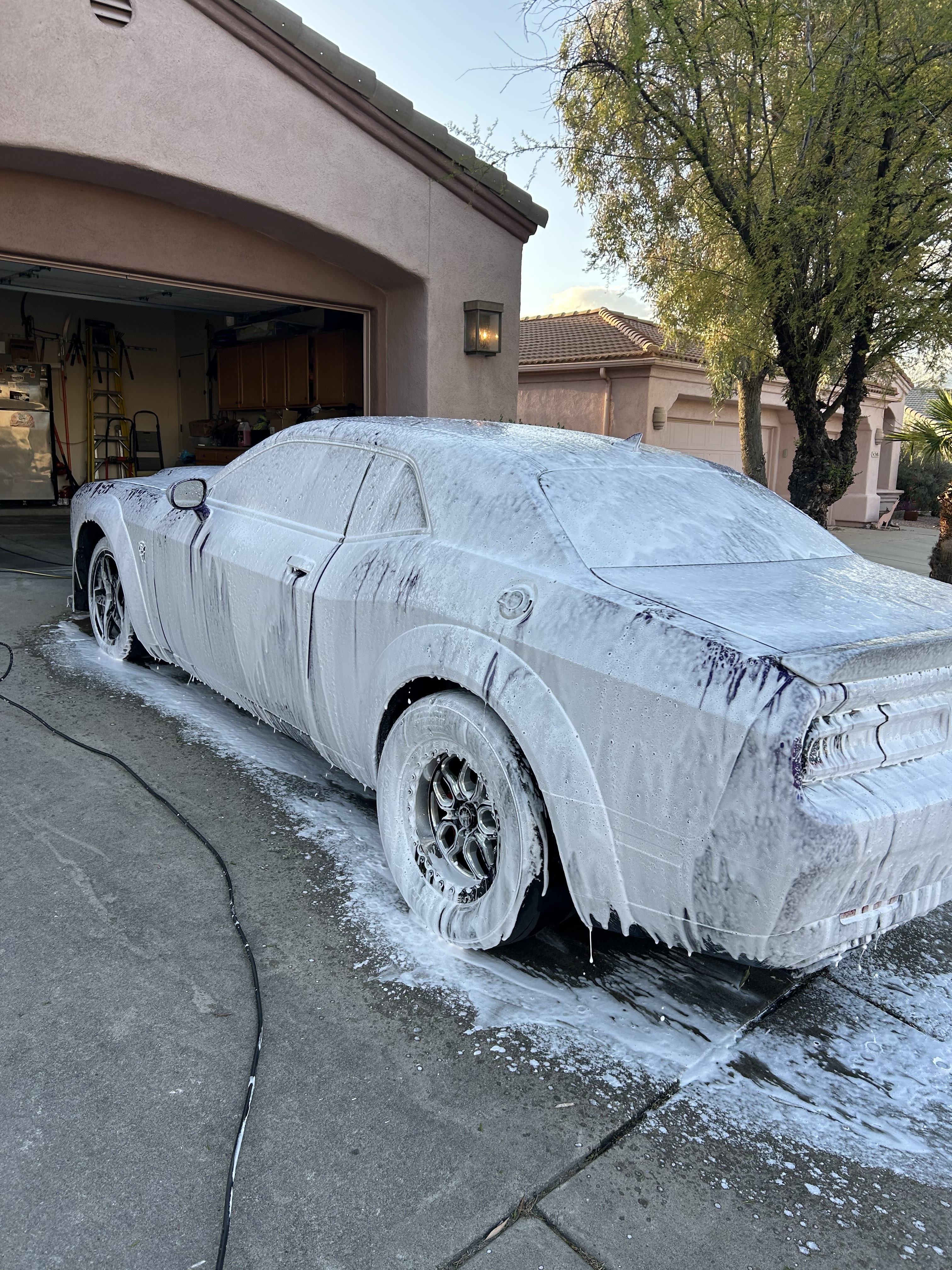 Exterior car detailing in Tucson AZ — hand wash, tire and rim shine, ceramic wax